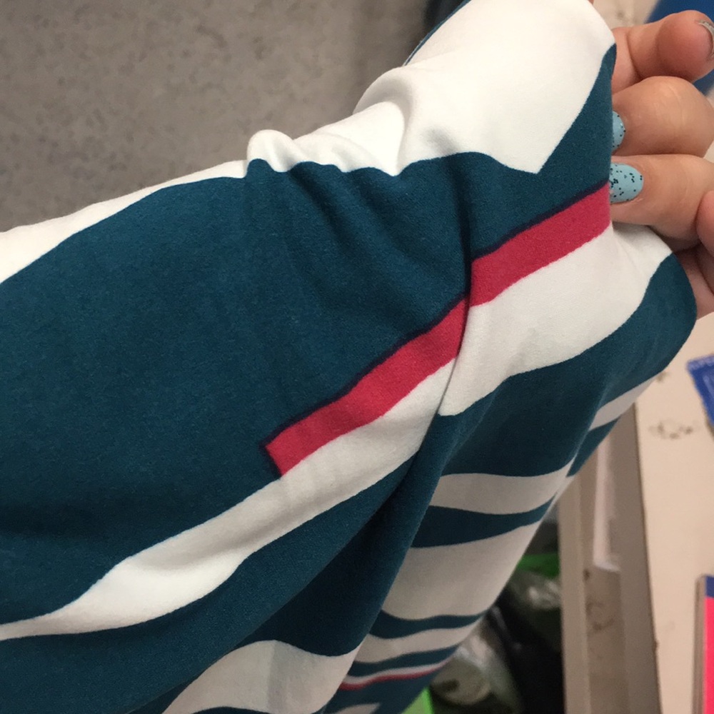 Teal and pink Lularoe leggings